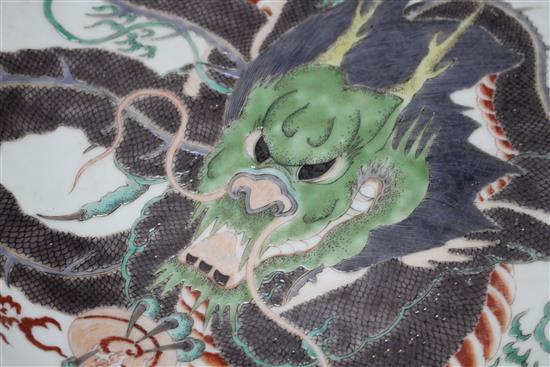 A Chinese famille verte dragon dish, 39cm